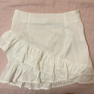 White asymmetrical mini skirt